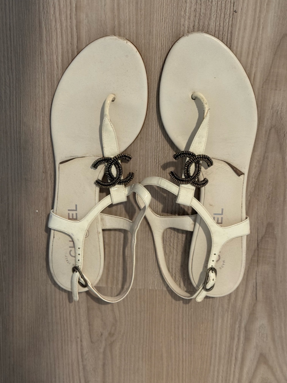 CHANEL Cream Leather T-Strap Sandals with Black Logo Accent